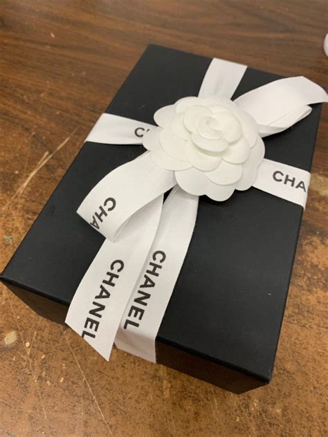 empty chanel box|Chanel perfume gift wrapped.